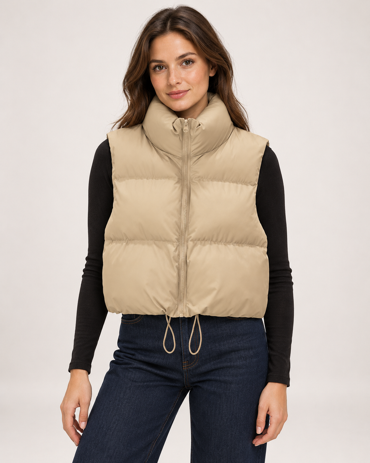 Women's beige cropped puffer gilet front view