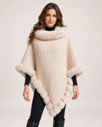 Women's beige cape coat with faux fur trim front view
