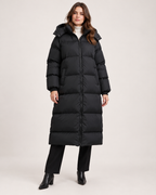 Women's black long hooded puffer coat closed front view