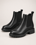 Women's black chunky Chelsea ankle boots pair