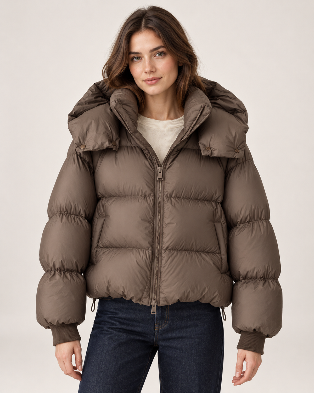 Women's brown puffer jacket with oversized hood front view