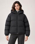 Women's black puffer jacket with hood and drawcord hem front view