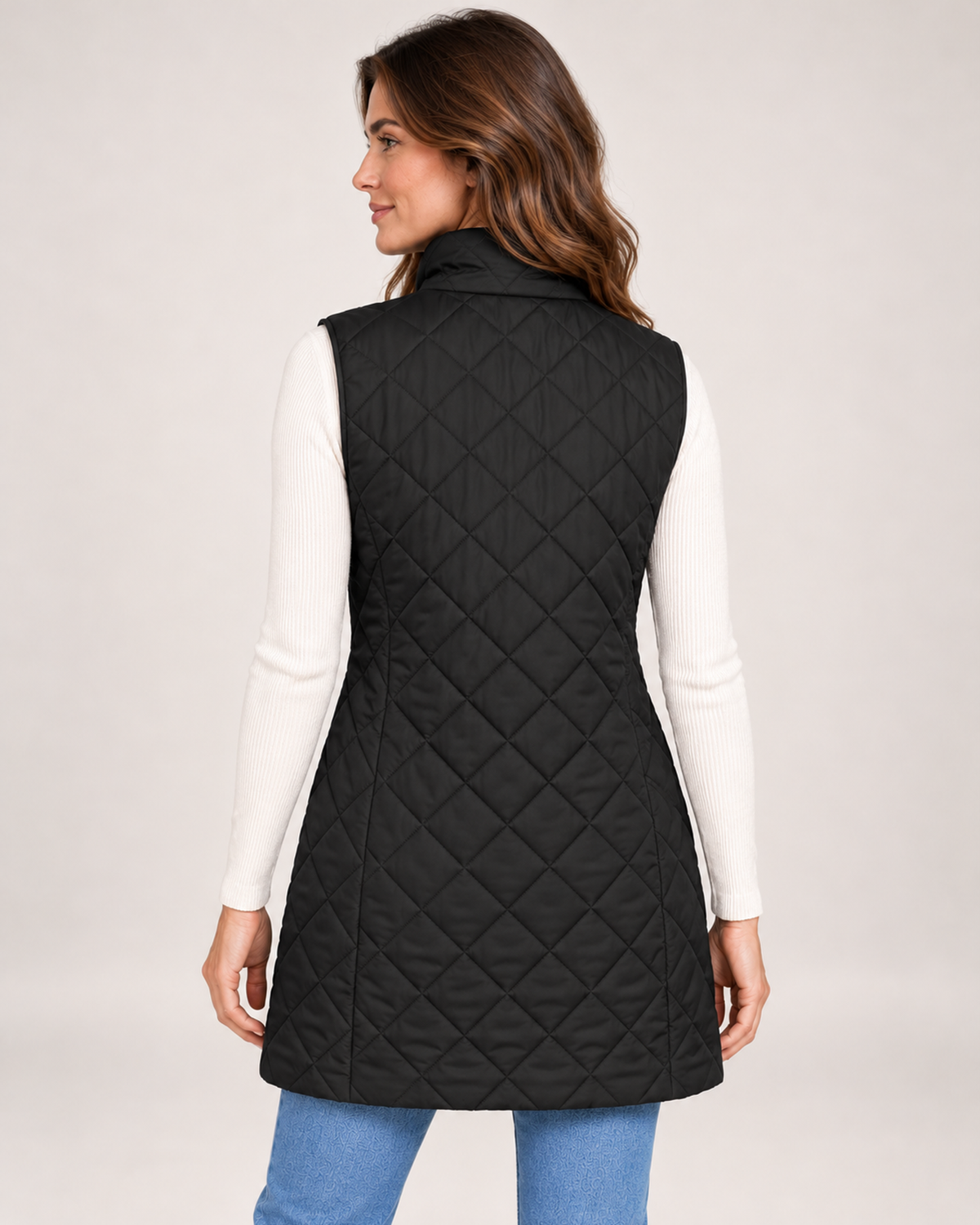 Women's black long quilted gilet back view