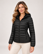Women's black quilted hooded jacket three quarter view
