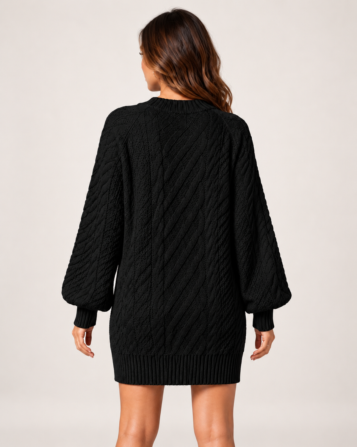 Women's black oversized cable knit jumper dress back view