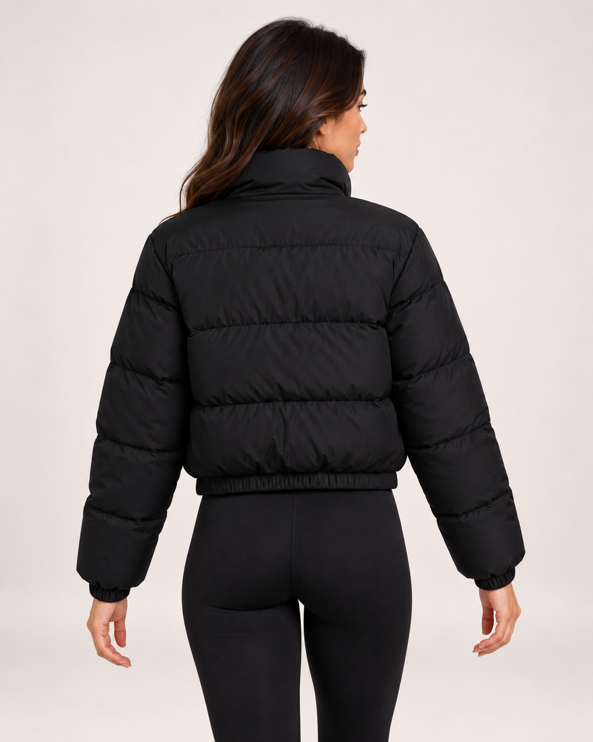 Women's black quilted cropped bomber jacket back view