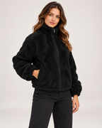 Women’s black fleece jacket close three quarter zipped view