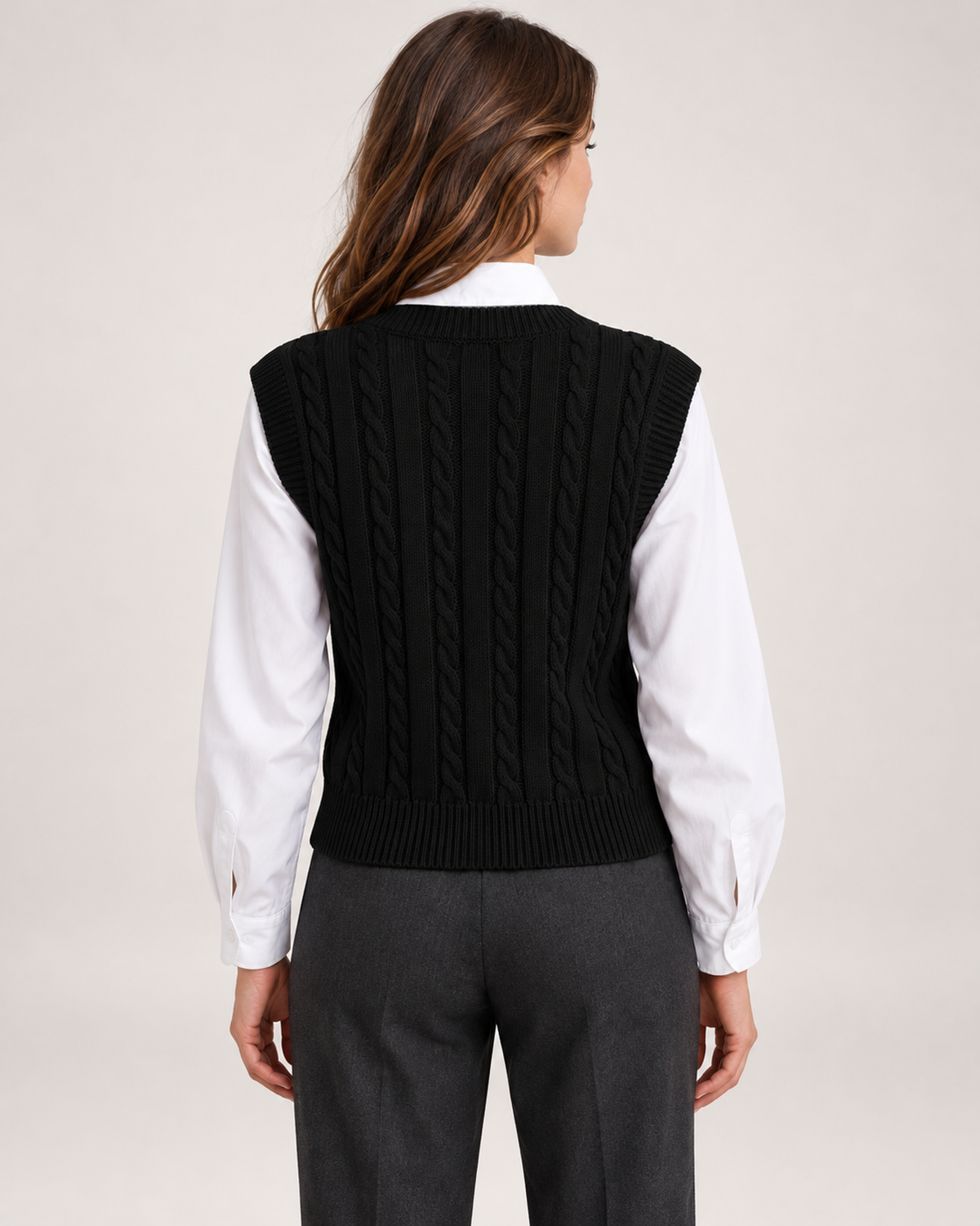 Women's black cable knit sweater vest close back view