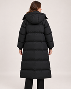 Women's black long hooded puffer coat back view