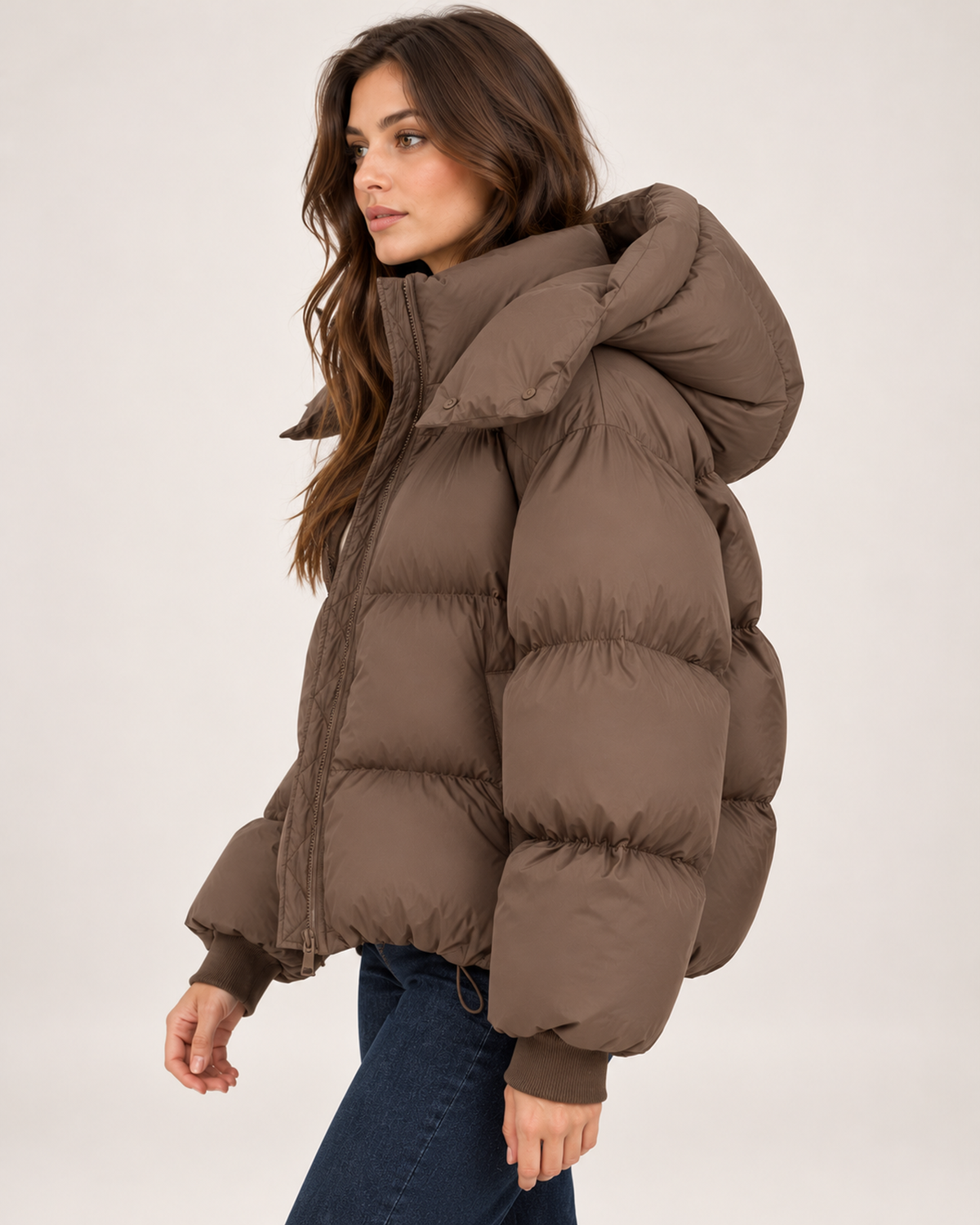 Women's brown puffer jacket with oversized hood side view