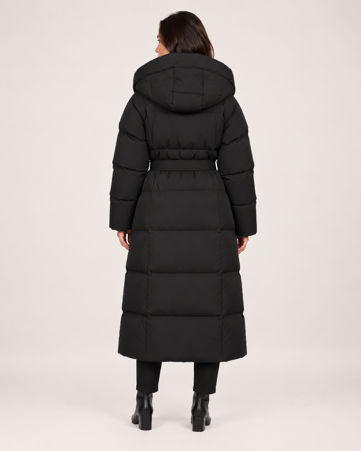 Women's black long puffer coat back view