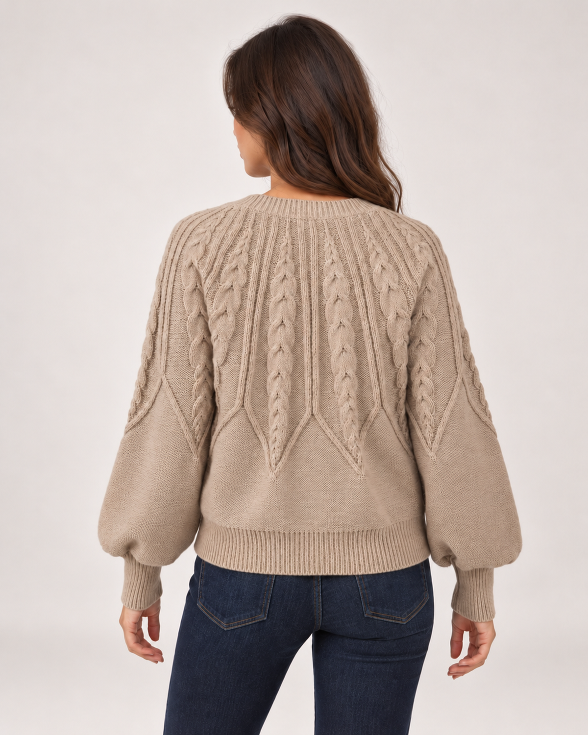 Women’s beige cable knit jumper rear view