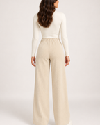 Women's light beige corduroy wide leg trousers back view