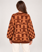 Back view of women's brown gingerbread Christmas jumper