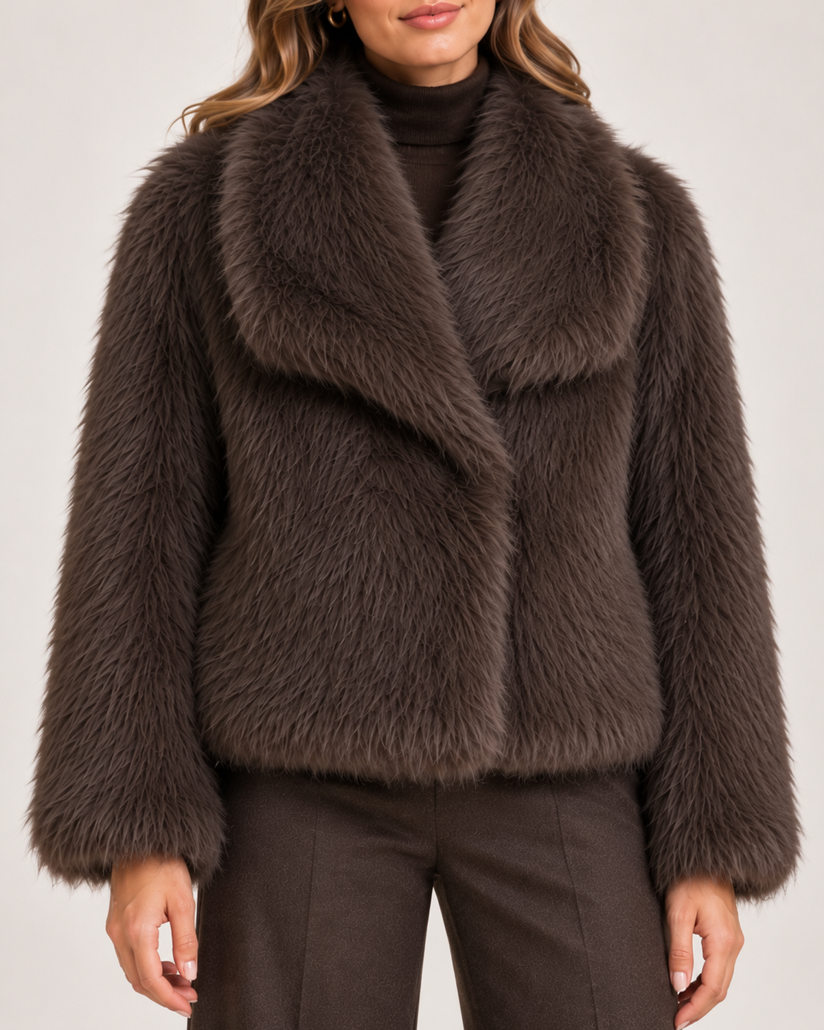Women's brown cropped faux fur jacket lapel and texture detail
