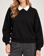 Women's black collared jumper neckline cuff and hem detail