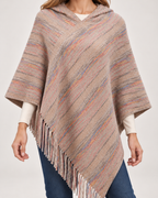 Women's striped hooded poncho weave and tassel detail