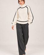 Women's white contrast trim turtleneck jumper full length styling view