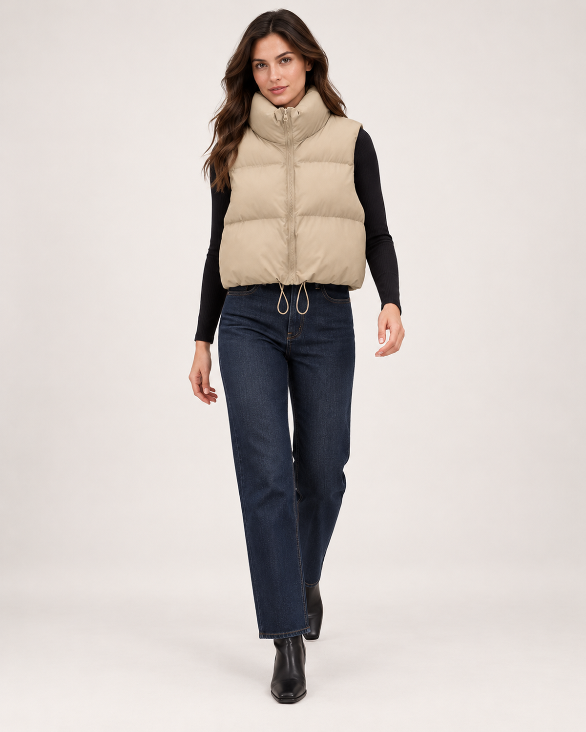 Women's beige cropped puffer gilet full length styling view
