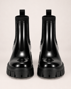Women's black gloss Chelsea Wellington boots front view
