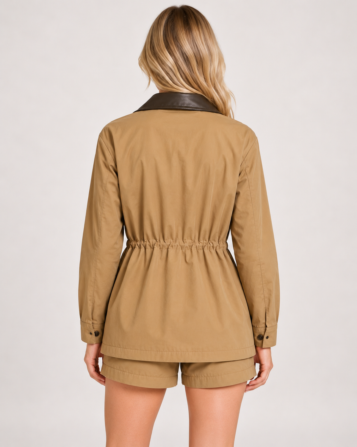 Back view of women's tan barn jacket with contrast collar