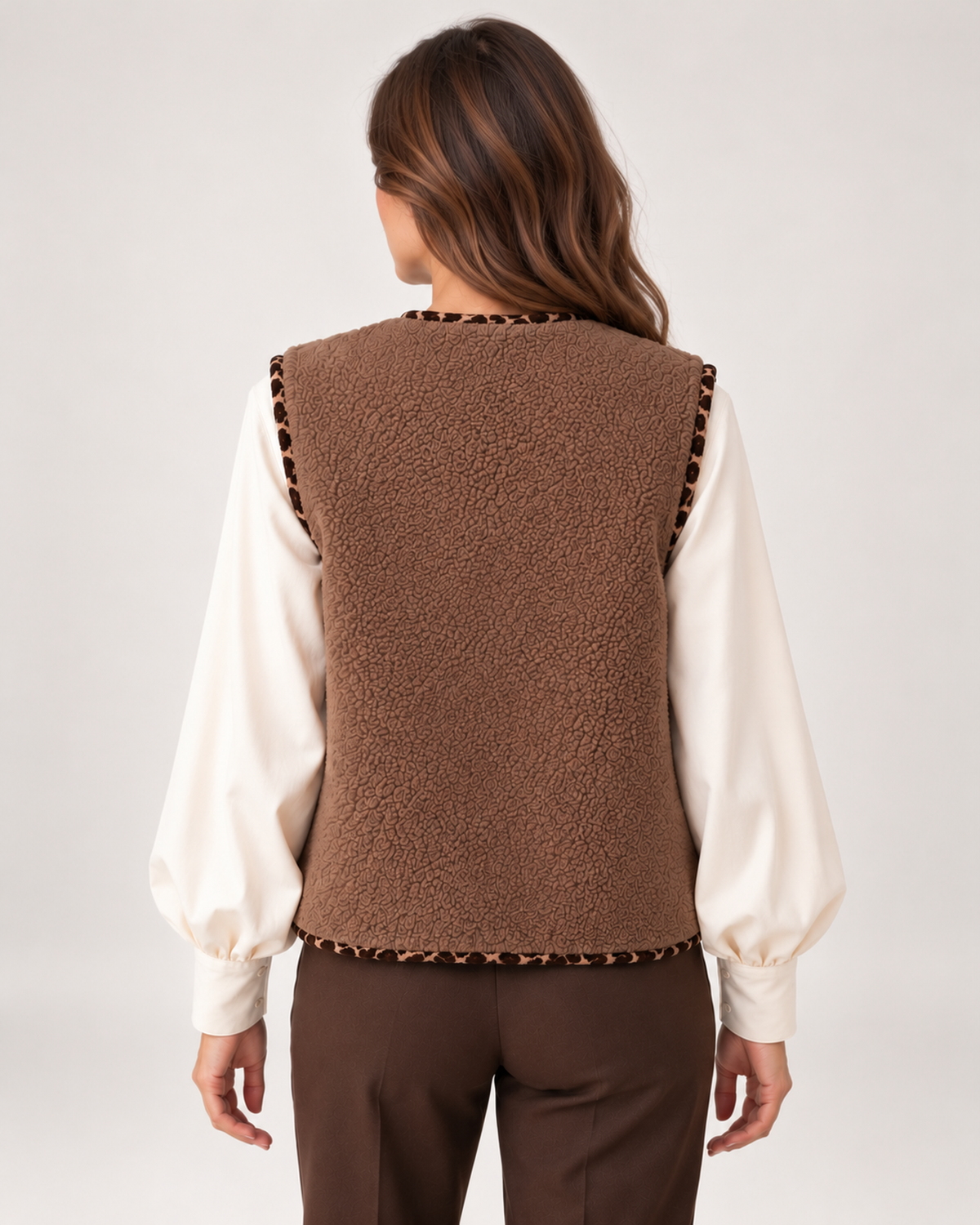 Back view of women's brown borg gilet