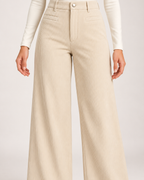 Women's light beige corduroy trousers waistband and pocket detail