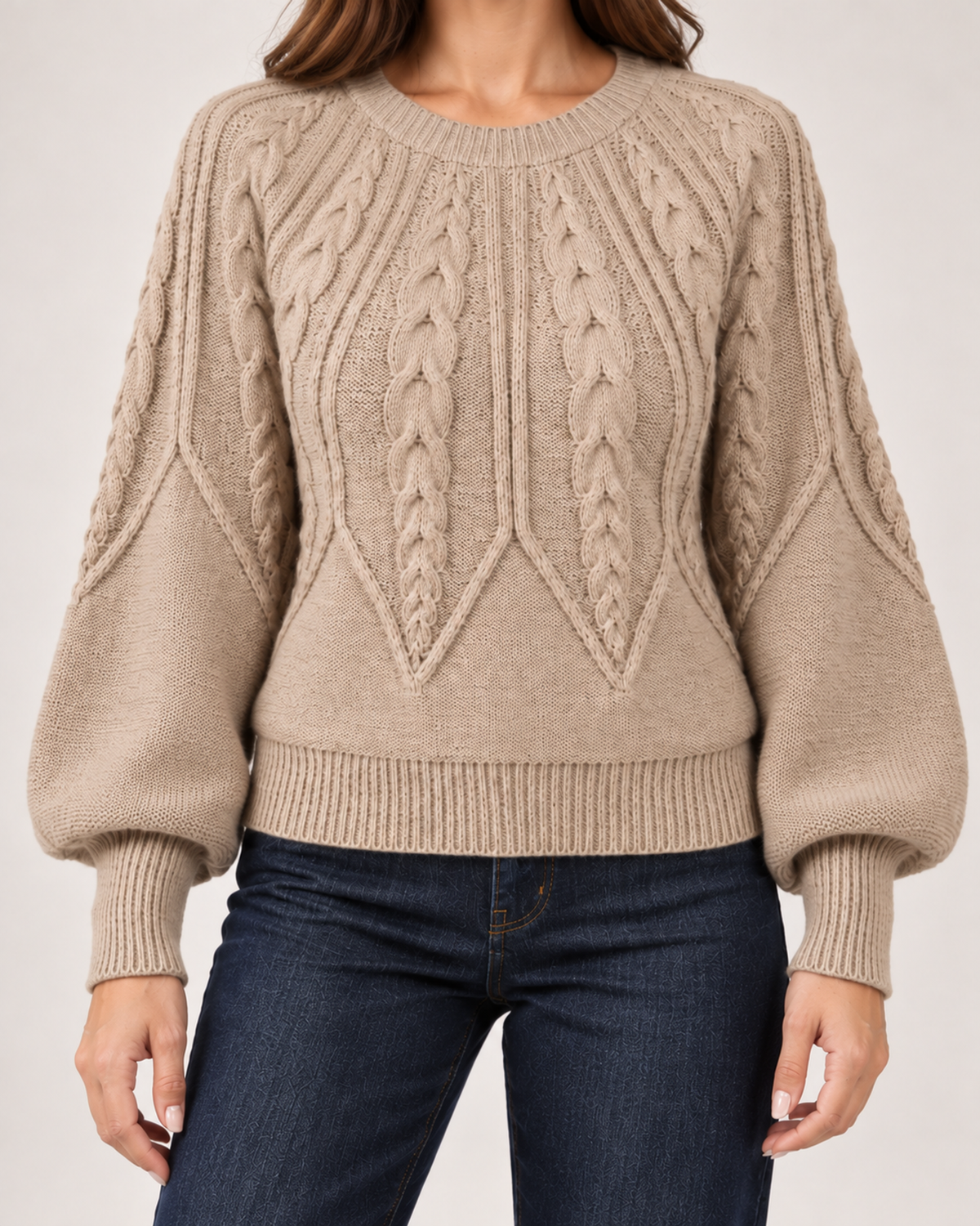 Women’s beige cable knit jumper pattern and sleeve detail