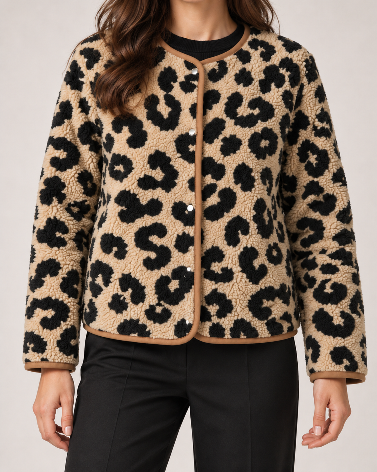 Women’s leopard print jacket texture and binding detail
