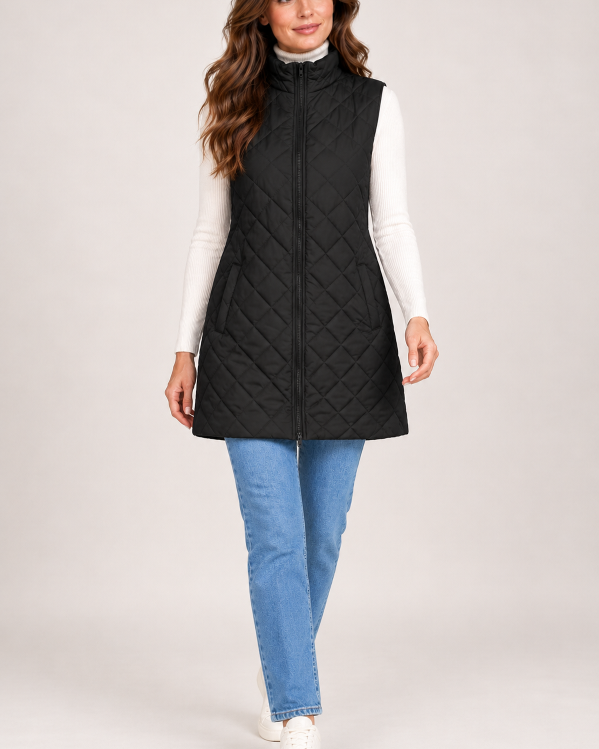 Women's black long quilted gilet full length styling view