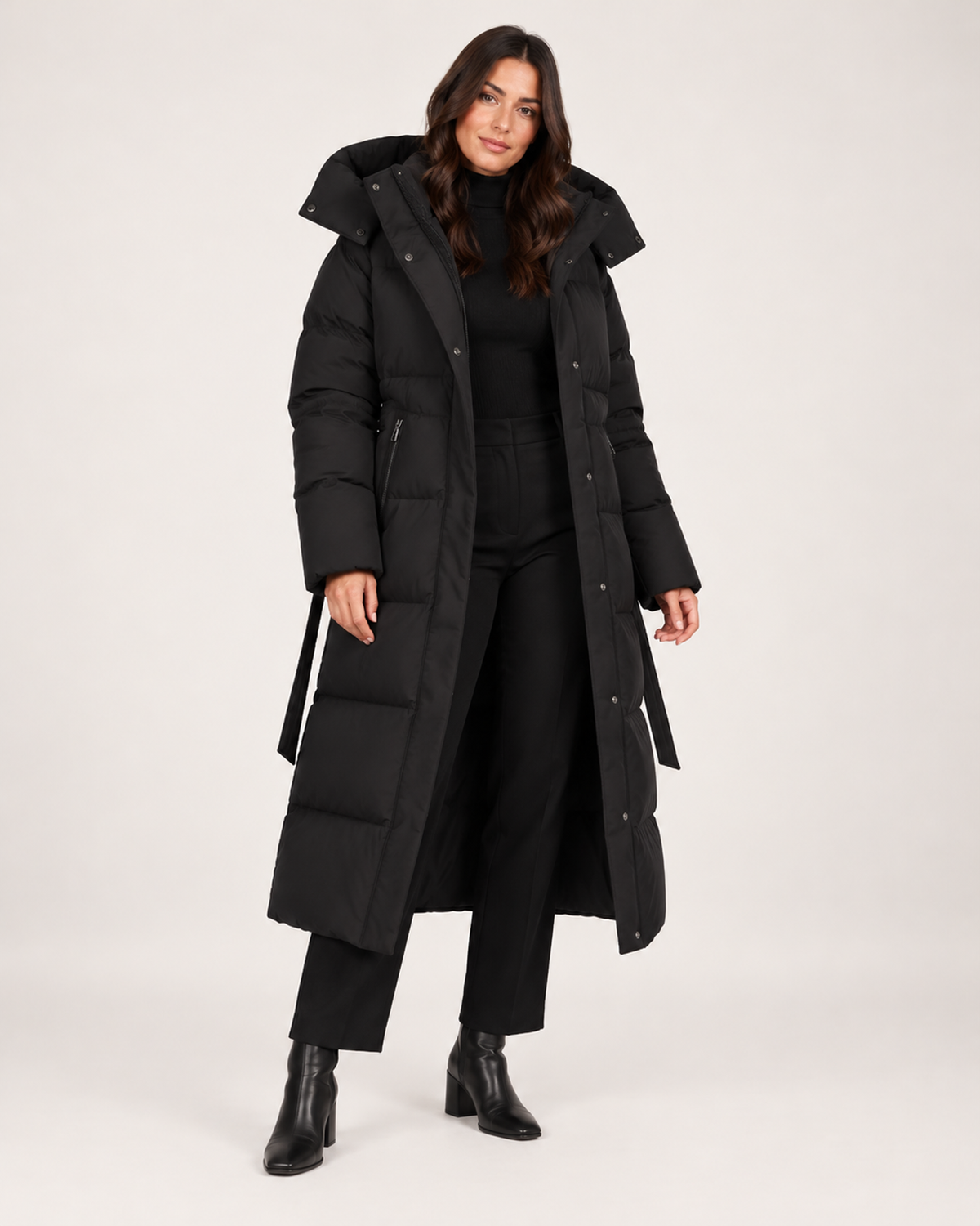Women's black long puffer coat open front view