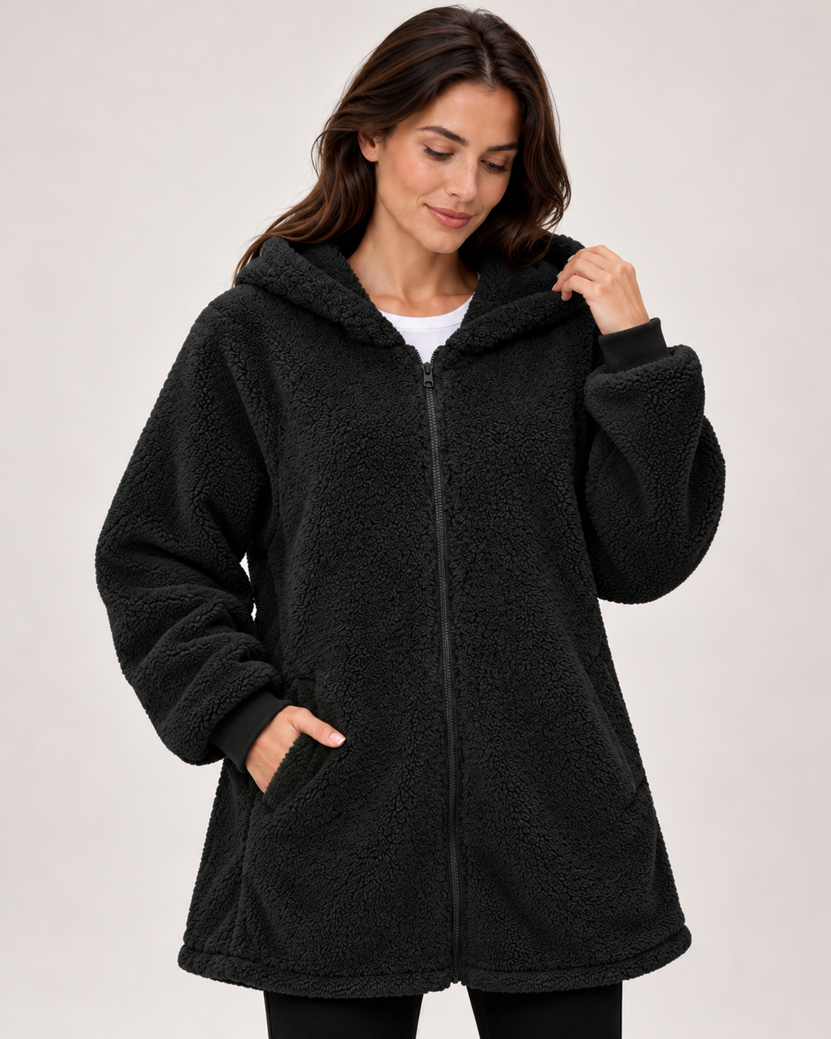 Women's black fleece hooded jacket close detail view