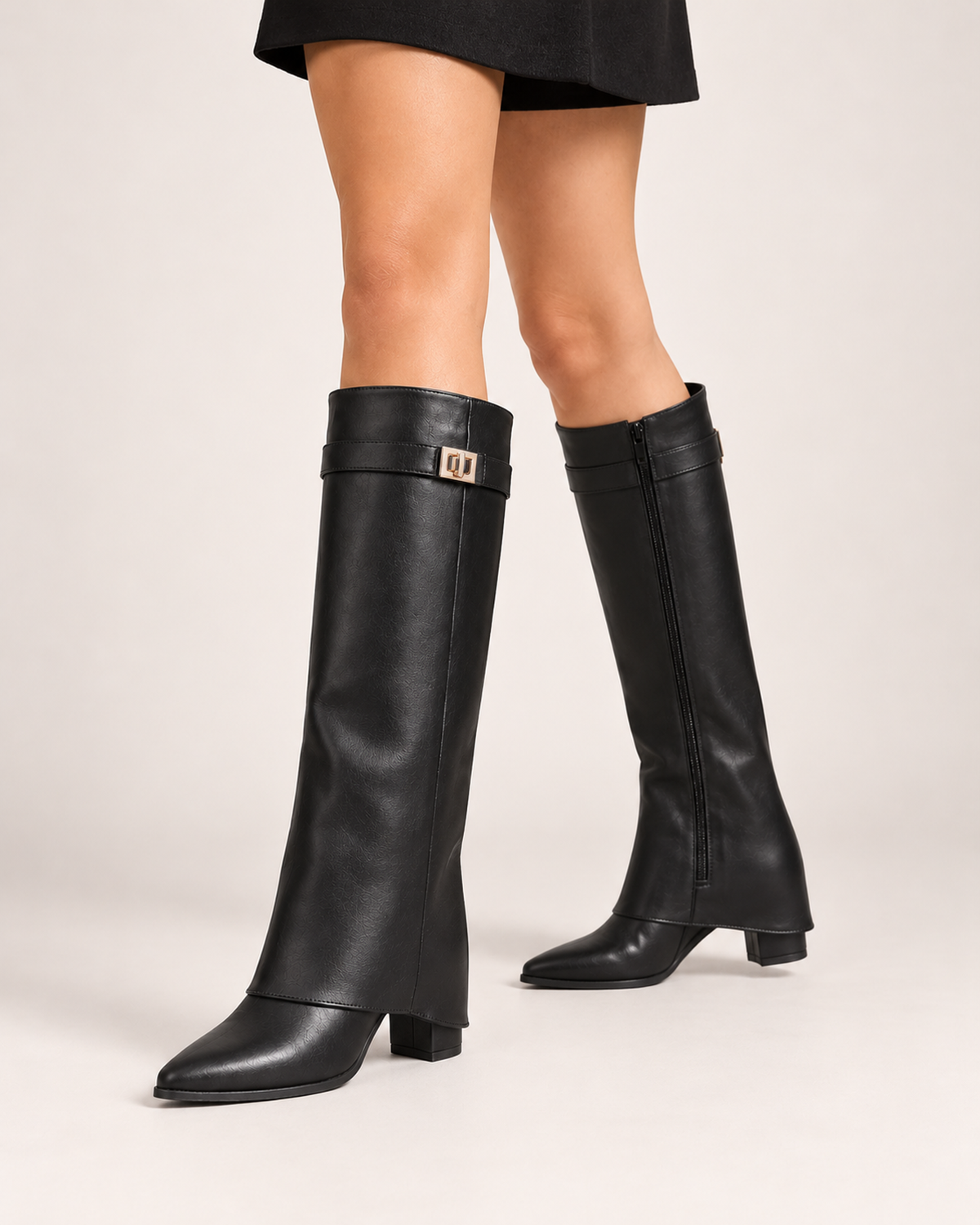 Women's black knee high low heel boots worn