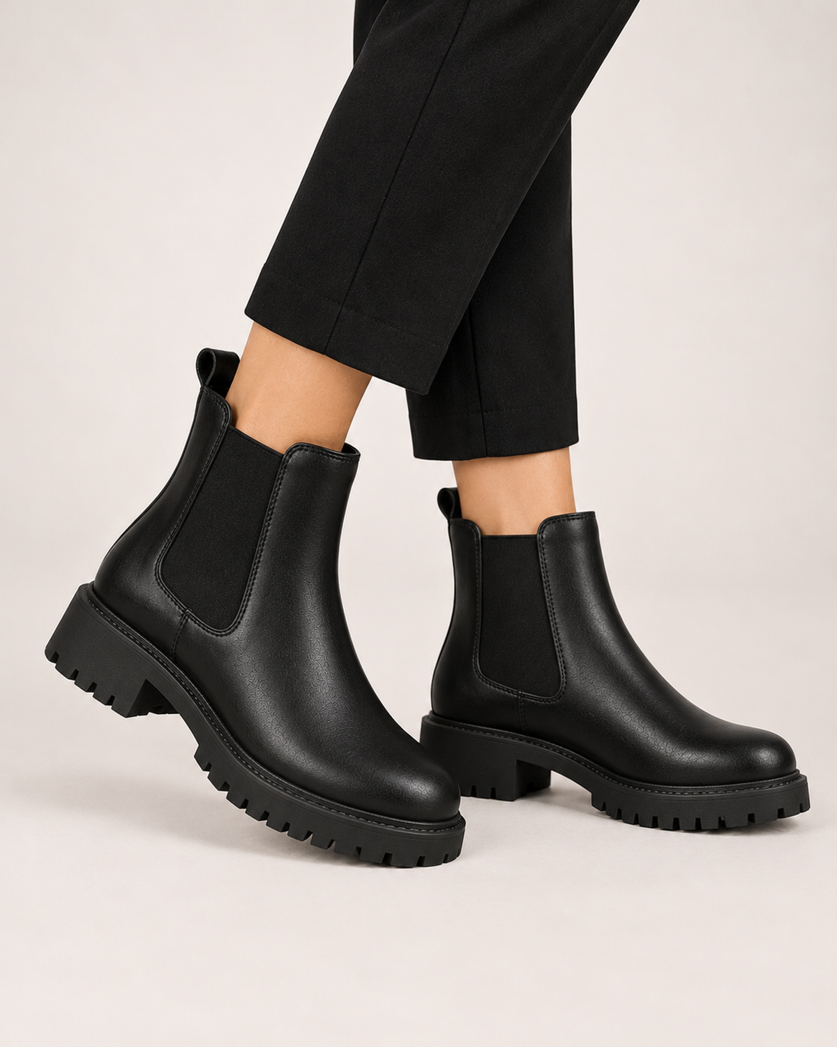 Women's black chunky Chelsea ankle boots worn