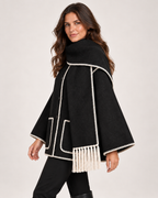 Women's black cape coat side view