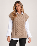 Women’s Knitted Vest with Longline Shape and Cable Detail in Beige, lower body product focus view