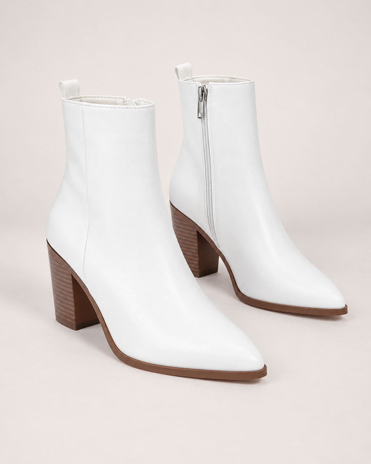 Women’s Heeled Ankle Boots with Side Zip in White, product only pair front three quarter view