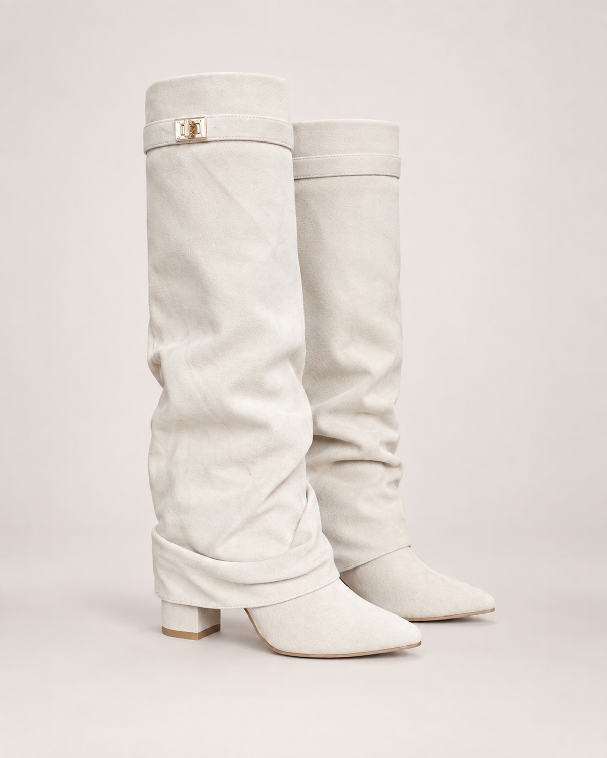 Women’s Knee High Boots with Pointed Toe and Metal Buckle in White, product only pair front three quarter view
