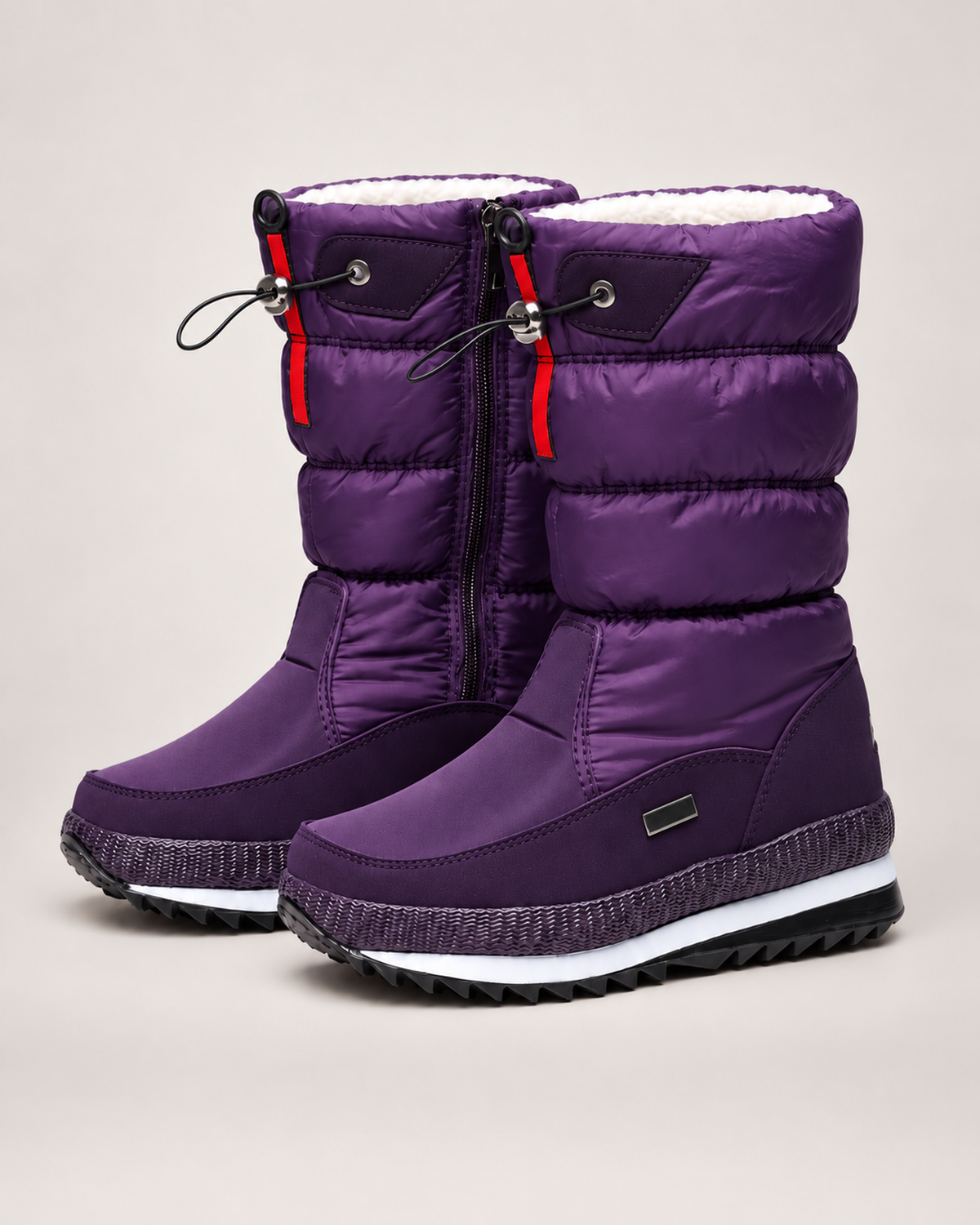 Women’s Snow Boots with Quilted Shaft and Treaded Sole in Purple, product only pair front three quarter view