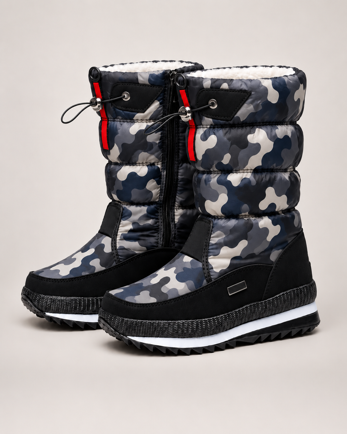 Women’s Snow Boots with Quilted Shaft and Treaded Sole in Camouflage Grey, product only pair front three quarter view